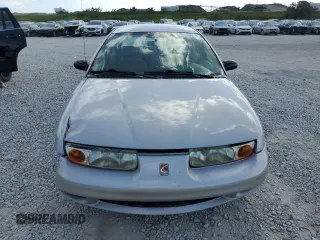 2000 Saturn SL z VIN 1G8ZK5276YZ224500, wystawiony jako Copart lot #45083945 z przebiegiem 130 766 mil mil oraz Szkoda całkowita • Salvage title. Historia ofert i sprzedaży dostępna na DreamBid. Obrazek 5.