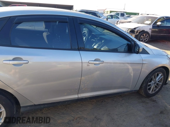 2015 Ford Focus SE with VIN 1FADP3F20FL355058, listed as a IAAI auction lot 41666337 with 144,887 mi miles. Bid and sale history available at carsss.com. Image 13.
