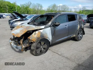 2014 Kia Sportage EX z VIN KNDPCCAC3E7630075, wystawiony jako Copart lot #55671655 z przebiegiem Nie podano mil oraz Szkoda całkowita • Salvage title. Historia ofert i sprzedaży dostępna na DreamBid. Obrazek 1.