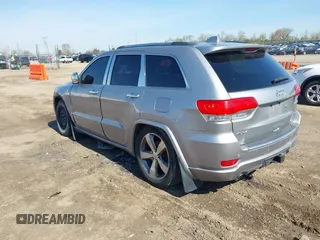 2014 Jeep Grand Cherokee Overland with VIN 1C4RJFCT9EC231840, listed as a IAAI auction lot 42114284 with 170,691 mi miles and . Bid and sale history available at DreamBid. Image 3.