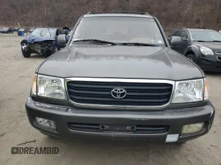2000 Toyota Land Cruiser z VIN JT3HT05J7Y0113942, wystawiony jako Copart lot #87448844 z przebiegiem 188 401 mil mil oraz Czysty tytuł • Clean title. Historia ofert i sprzedaży dostępna na DreamBid. Obrazek 5.