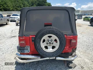 2001 Jeep Wrangler Sport with VIN 1J4FA49S51P365327, listed as a Copart auction lot 61720115 with 194,086 mi miles and Salvage title. Bid and sale history available at DreamBid. Image 6.
