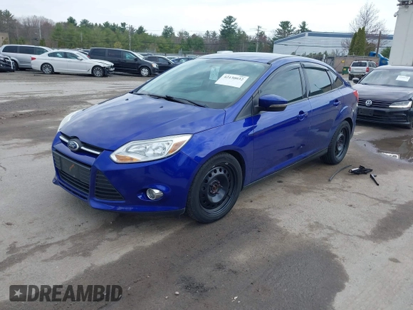 2014 Ford Focus SE with VIN 1FADP3F21EL314534, listed as a IAAI auction lot 42130032 with 103,866 mi miles. Bid and sale history available at carsss.com. Image 2.