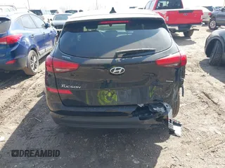 2019 Hyundai Tucson SE with VIN KM8J2CA4XKU852946, listed as a IAAI auction lot 41784214 with 120,857 mi miles. Bid and sale history available at carsss.com. Image 16.