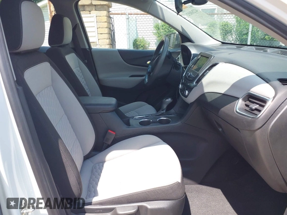 2020 Chevrolet Equinox LS z VIN 3GNAXSEVXLS602800, wystawiony jako IAAI lot #42268052 z przebiegiem 96 159 mil mil oraz . Historia ofert i sprzedaży dostępna na DreamBid. Obrazek 5.