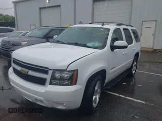 2009 Chevrolet Tahoe 2LT z VIN 1GNFC23059R217780, wystawiony jako IAAI lot #42334678 z przebiegiem 136 182 mil mil oraz . Historia ofert i sprzedaży dostępna na DreamBid. Obrazek 2.