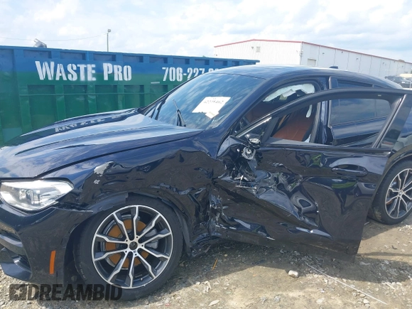 2020 BMW X4 xDrive30i z VIN 5UX2V1C04LLE67552, wystawiony jako IAAI lot #42248462 z przebiegiem 84 531 mil mil oraz . Historia ofert i sprzedaży dostępna na DreamBid. Obrazek 6.