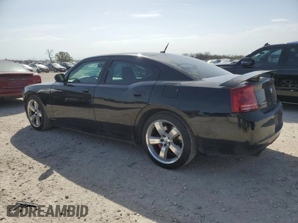 2008 Dodge Charger SRT-8 with VIN 2B3KA73W48H284076, listed as a Copart auction lot 48109825 with 156,174 mi miles and Salvage Title. Bid and sale history available at carsss.com. Image 2.
