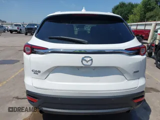 2019 Mazda CX-9 Touring z VIN JM3TCBCY2K0300702, wystawiony jako IAAI lot #42194050 z przebiegiem 98 247 mil mil oraz . Historia ofert i sprzedaży dostępna na DreamBid. Obrazek 17.