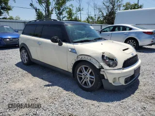 2014 MINI Clubman S z VIN WMWZG3C50ET801008, wystawiony jako Copart lot #57430295 z przebiegiem 145 264 mil mil oraz Szkoda całkowita • Salvage title. Historia ofert i sprzedaży dostępna na DreamBid. Obrazek 4.