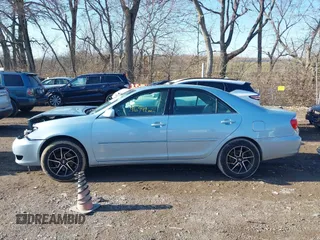 2006 Toyota Camry LE z VIN 4T1BF30K46U621829, wystawiony jako IAAI lot #41068239 z przebiegiem 96 942 mil mil oraz . Historia ofert i sprzedaży dostępna na DreamBid. Obrazek 14.