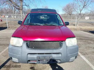 2003 Ford Escape XLT Popular 2 with VIN 1FMCU93183KC65571, listed as a IAAI auction lot 41768982 with 150,658 mi miles. Bid and sale history available at carsss.com. Image 12.