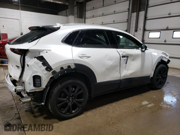 2023 Mazda CX-30 Premium Plus with VIN 3MVDMBEY3PM587798, listed as a Copart auction lot 86524444 with 9,860 mi miles and Salvage title. Bid and sale history available at DreamBid. Image 3.