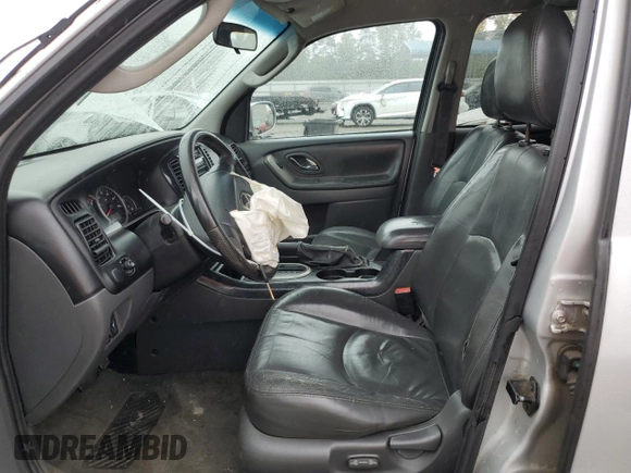 2006 Mazda Tribute i with VIN 4F2YZ02Z26KM14821, listed as a Copart auction lot 71718434 with 318,841 mi miles and Salvage Title. Bid and sale history available at carsss.com. Image 7.