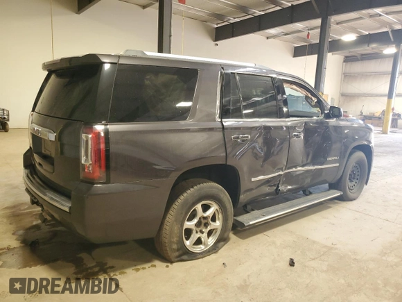2015 GMC Yukon Denali with VIN 1GKS2CKJ2FR677604, listed as a Copart auction lot 51714505 with 146,648 mi miles and Salvage Title. Bid and sale history available at carsss.com. Image 3.