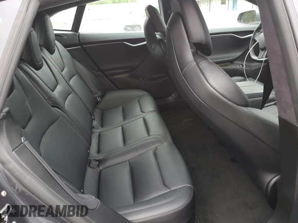 2019 Tesla Model S 75D z VIN 5YJSA1E23KF312145, wystawiony jako Copart lot #57344975 z przebiegiem 33 092 mil mil oraz Szkoda całkowita • Salvage title. Historia ofert i sprzedaży dostępna na DreamBid. Obrazek 10.