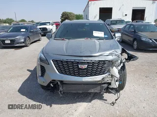 2023 Cadillac XT4 AWD Premium Luxury with VIN 1GYFZDR47PF163923, listed as a IAAI auction lot 42136236 with 52,012 mi miles and . Bid and sale history available at DreamBid. Image 12.