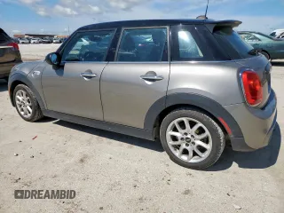 2018 MINI Hardtop 4 Door Cooper S with VIN WMWXU3C50J2F50669, listed as a Copart auction lot 55924355 with 64,702 mi miles and Salvage title. Bid and sale history available at DreamBid. Image 2.