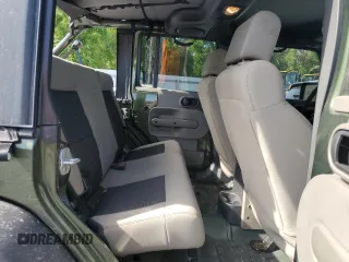 2008 Jeep Wrangler Unlimited X with VIN 1J4GB39108L608465, listed as a Copart auction lot 50949015 with 103,205 mi miles and Salvage Title. Bid and sale history available at DreamBid. Image 10.