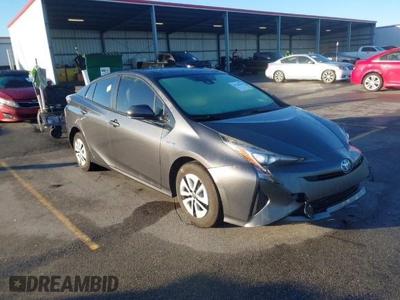 2017 Toyota Prius Two z VIN JTDKARFU4H3042976, wystawiony jako IAAI lot #41740418 z przebiegiem 66 734 mil mil oraz . Historia ofert i sprzedaży dostępna na DreamBid. Obrazek 1.