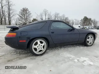 1993 Porsche 928 z VIN WP0AA2929PS815135, wystawiony jako Copart lot #86840514 z przebiegiem 69 263 mil mil oraz Szkody całkowita. Historia ofert i sprzedaży dostępna na DreamBid. Obrazek 3.