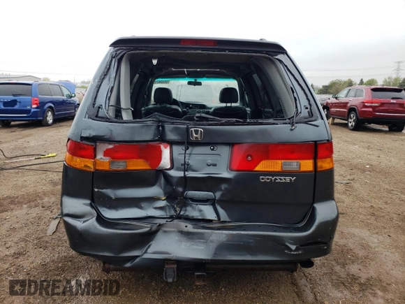 2004 Honda Odyssey EX-L z VIN 5FNRL18924B040028, wystawiony jako Copart lot #55338715 z przebiegiem 242 055 mil mil oraz Szkoda całkowita • Salvage title. Historia ofert i sprzedaży dostępna na DreamBid. Obrazek 6.