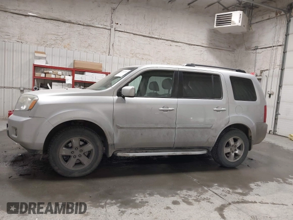2011 Honda Pilot EX-L with VIN 5FNYF4H66BB029802, listed as a IAAI auction lot 42101545 with 240,127 mi miles and . Bid and sale history available at carsss.com. Image 14.