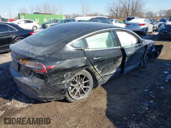 2020 Tesla Model 3 Standard Range Plus z VIN 5YJ3E1EA0LF739011, wystawiony jako IAAI lot #41379792 z przebiegiem Nie podano mil oraz . Historia ofert i sprzedaży dostępna na DreamBid. Obrazek 4.