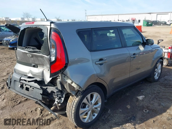 2015 Kia Soul + with VIN KNDJP3A5XF7185380, listed as a IAAI auction lot 41772650 with 79,189 mi miles. Bid and sale history available at carsss.com. Image 4.