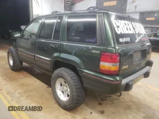 1995 Jeep Grand Cherokee Limited with VIN 1J4GZ78S7SC766726, listed as a Copart auction lot 84909134 with 174,256 mi miles and Salvage Title. Bid and sale history available at carsss.com. Image 2.
