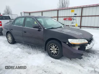 1998 Honda Accord LX z VIN 1HGCG1645WA000699, wystawiony jako IAAI lot #41598273 z przebiegiem 186 732 mil mil oraz . Historia ofert i sprzedaży dostępna na DreamBid. Obrazek 1.