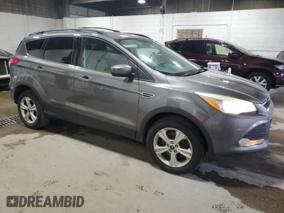 2013 Ford Escape SE with VIN 1FMCU9G96DUB33138, listed as a Copart auction lot 61851665 with 148,742 mi miles and Salvage title. Bid and sale history available at DreamBid. Image 4.