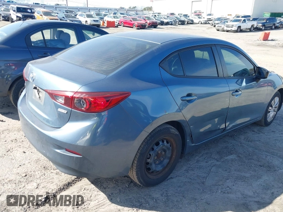 2014 Mazda 3 i SV with VIN JM1BM1T78E1186139, listed as a IAAI auction lot 41753058 with 117,197 mi miles and . Bid and sale history available at DreamBid. Image 4.