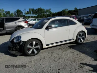 2012 Volkswagen Beetle 2.0T Turbo w/Sun/Snd/Nav PZEV with VIN 3VWVA7AT7CM631038, listed as a Copart auction lot 50749973 with 75,581 mi miles and Salvage Title. Bid and sale history available at carsss.com. Image 1.