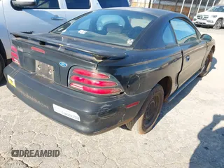 1995 Ford Mustang with VIN 1FALP4042SF278701, listed as a IAAI auction lot 41776409 with 203,241 mi miles and . Bid and sale history available at DreamBid. Image 4.