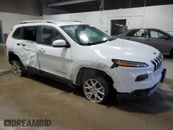 2016 Jeep Cherokee Latitude with VIN 1C4PJMCB3GW157626, listed as a Copart auction lot 50711785 with 133,564 mi miles and Salvage Title. Bid and sale history available at carsss.com. Image 4.