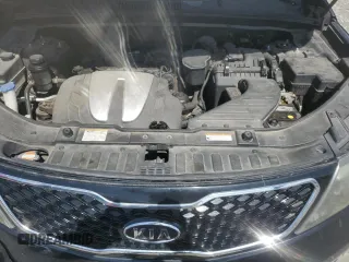 2012 Kia Sorento SX z VIN 5XYKW4A28CG193611, wystawiony jako Copart lot #57659935 z przebiegiem 203 349 mil mil oraz Szkoda całkowita • Salvage title. Historia ofert i sprzedaży dostępna na DreamBid. Obrazek 11.