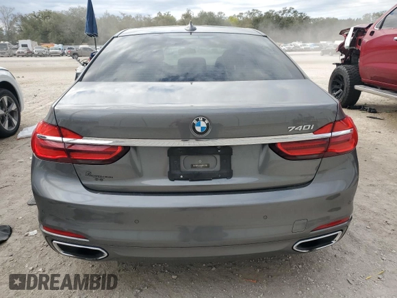 2019 BMW 7 Series 740i z VIN WBA7E2C50KB454532, wystawiony jako Copart lot #89005785 z przebiegiem 93 921 mil mil oraz Czysty tytuł • Clean title. Historia ofert i sprzedaży dostępna na DreamBid. Obrazek 6.