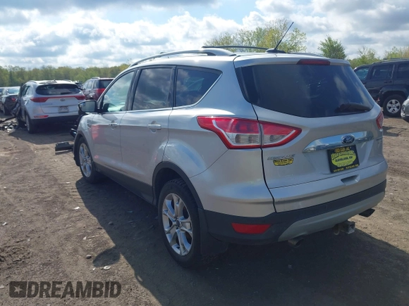 2015 Ford Escape Titanium z VIN 1FMCU9J99FUC75852, wystawiony jako IAAI lot #42171467 z przebiegiem 113 322 mil mil oraz . Historia ofert i sprzedaży dostępna na DreamBid. Obrazek 3.