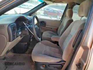 2003 Chevrolet Venture 1SA z VIN 1GNDX03E23D313074, wystawiony jako Copart lot #80559294 z przebiegiem 100 134 mil mil oraz Szkody całkowita. Historia ofert i sprzedaży dostępna na DreamBid. Obrazek 7.