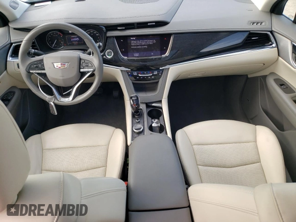 2023 Cadillac XT6 FWD Premium Luxury with VIN 1GYKPCRS5PZ120161, listed as a Copart auction lot 54614235 with 39,700 mi miles and Salvage title. Bid and sale history available at DreamBid. Image 8.