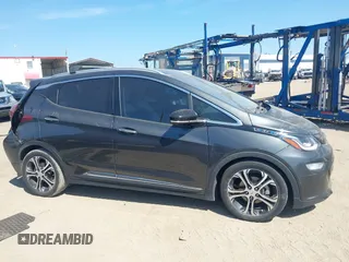 2018 Chevrolet Bolt EV Premier z VIN 1G1FX6S04J4116505, wystawiony jako IAAI lot #42258808 z przebiegiem 103 089 mil mil oraz . Historia ofert i sprzedaży dostępna na DreamBid. Obrazek 14.