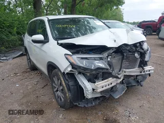 2022 Honda Pilot EX-L with VIN 5FNYF6H59NB018137, listed as a IAAI auction lot 42344347 with 70,768 mi miles and . Bid and sale history available at DreamBid. Image 1.