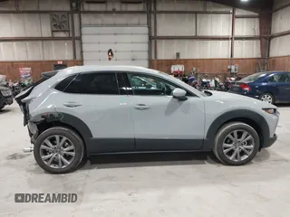 2025 Mazda CX-30 S Premium with VIN 3MVDMBDM5SM788786, listed as a IAAI auction lot 42126428 with 1,370 mi miles and . Bid and sale history available at DreamBid. Image 14.