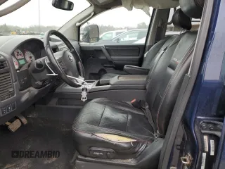 2011 Nissan Titan Pro-4X z VIN 1N6BA0EC0BN322228, wystawiony jako Copart lot #47617305 z przebiegiem 189 151 mil mil oraz Szkoda całkowita • Salvage title. Historia ofert i sprzedaży dostępna na DreamBid. Obrazek 7.