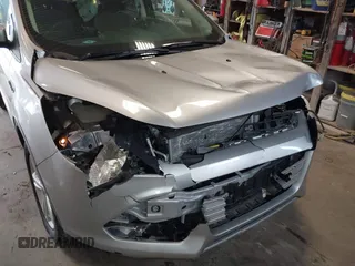 2015 Ford Escape SE with VIN 1FMCU0GX4FUC22042, listed as a IAAI auction lot 42094798 with 35,407 mi miles and . Bid and sale history available at DreamBid. Image 6.