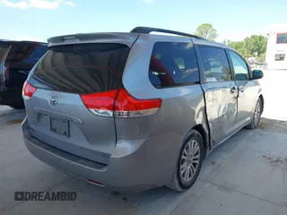2011 Toyota Sienna XLE AAS with VIN 5TDYK3DC1BS007820, listed as a IAAI auction lot 41935200 with 123,554 mi miles. Bid and sale history available at carsss.com. Image 4.