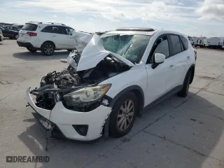 2013 Mazda CX-5 Touring with VIN JM3KE2CE9D0137982, listed as a Copart auction lot 43260805 with 0 mi miles and Salvage Title. Bid and sale history available at carsss.com. Image 1.