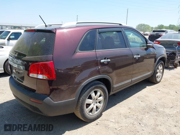 2012 Kia Sorento LX with VIN 5XYKT4A27CG195861, listed as a IAAI auction lot 42241593 with 175,282 mi miles and . Bid and sale history available at carsss.com. Image 4.