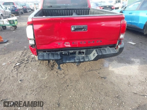 2018 Toyota Tacoma SR with VIN 5TFRX5GN5JX127708, listed as a IAAI auction lot 41654693 with 69,236 mi miles and . Bid and sale history available at DreamBid. Image 6.